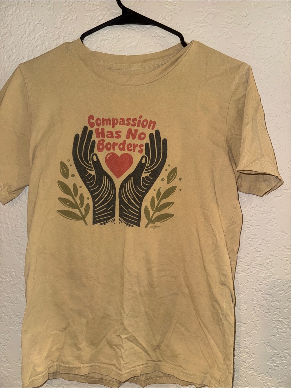 Kids 'Compassion Has No Borders' Short Sleeve T‑Shirt in Light Tan